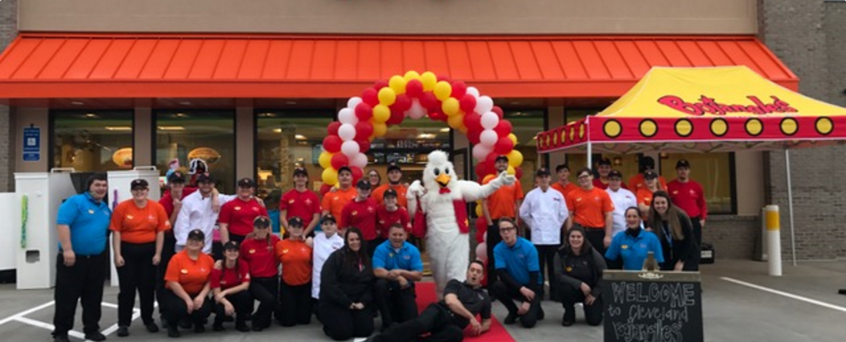 Bojangles' staff picture in front of restaurant